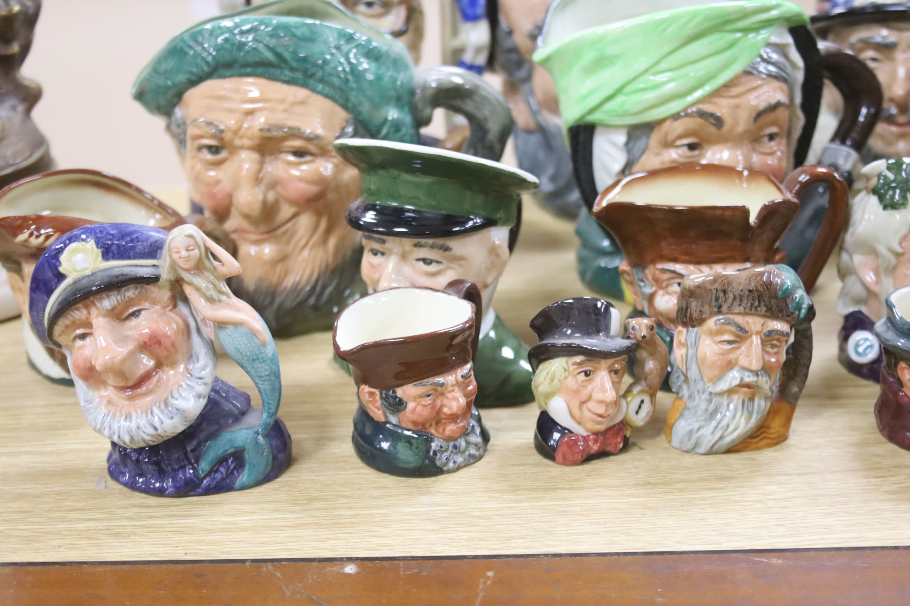 A collection of seventeen Royal Doulton character mugs